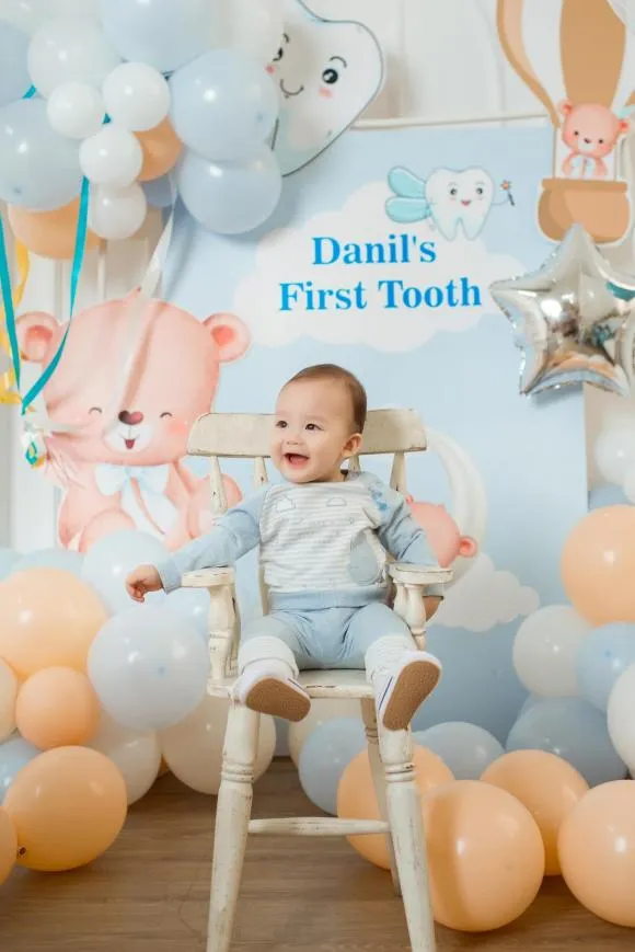 thu-mon-bui-tien-dung-khoe-bo-anh-nhan-dip-con-trai-moc-chiec-rang-dau-tien-4