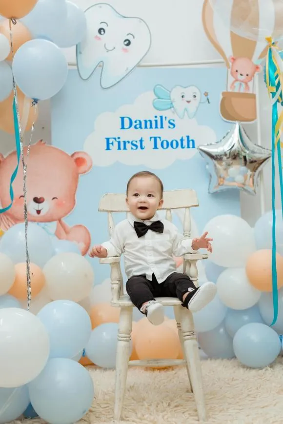 thu-mon-bui-tien-dung-khoe-bo-anh-nhan-dip-con-trai-moc-chiec-rang-dau-tien-6