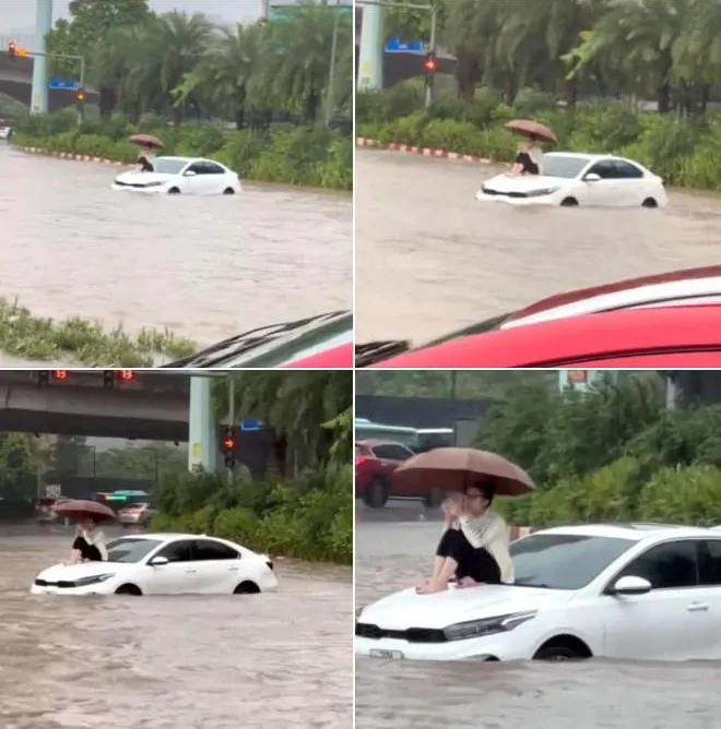 danh-tinh-co-gai-ngoi-tren-noc-capo-luot-dien-thoai-giua-bien-nuoc-ha-noi-sang-nay-1