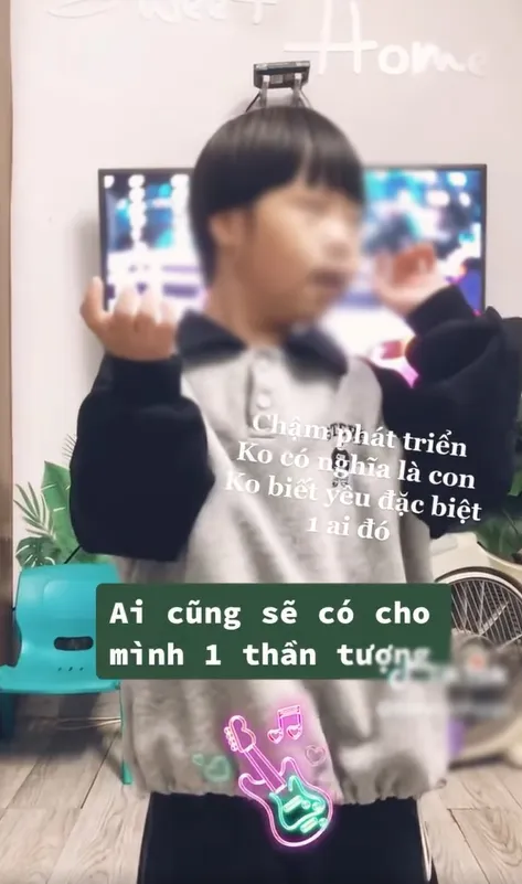 Cau-be-mac-benh-down-nhung-khi-nghe-nhac-Truc-Nhan-la-bung-sang