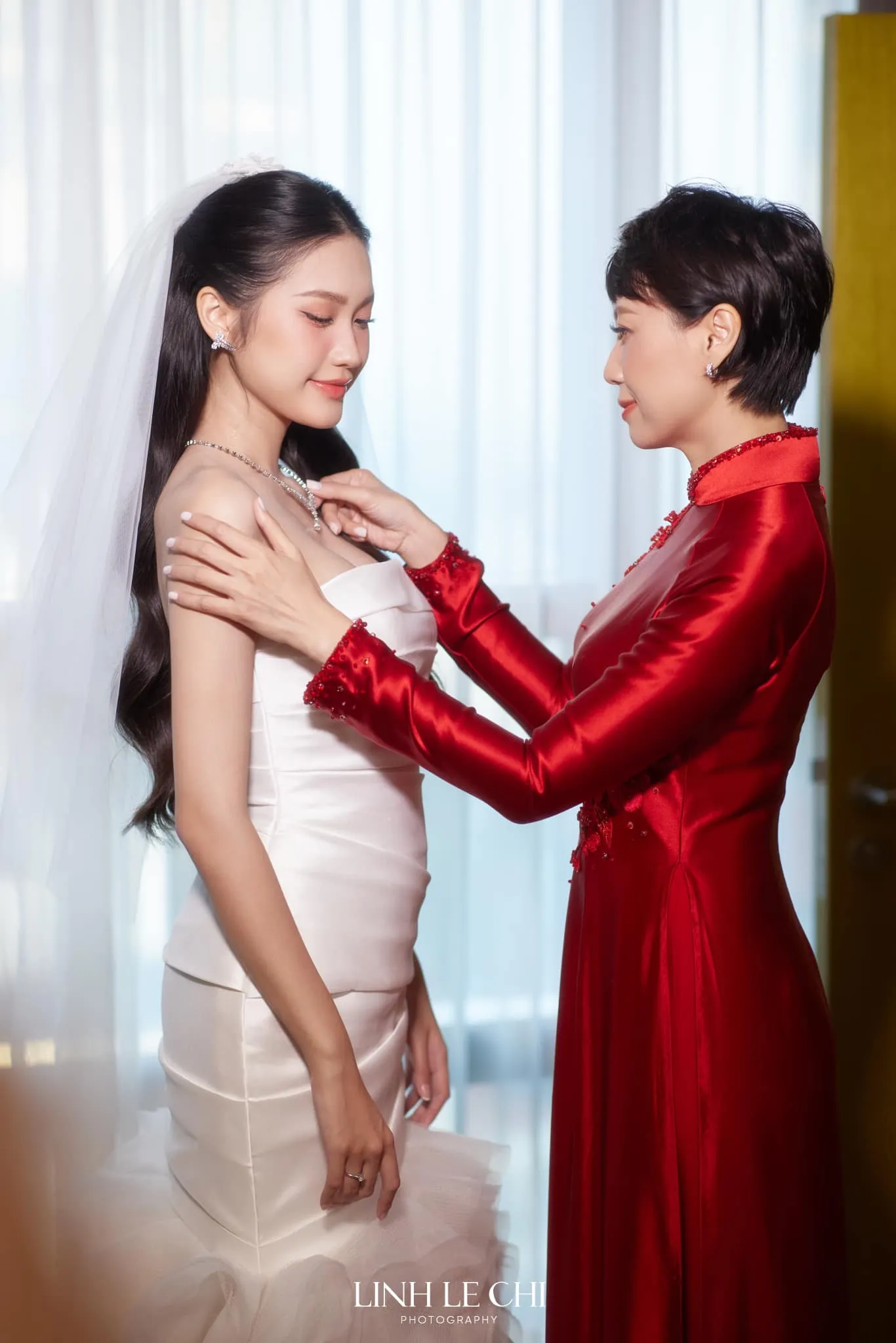 3-chiec-ao-dai-me-doan-hai-my-mac-trong-dam-cuoi-con-gai-3