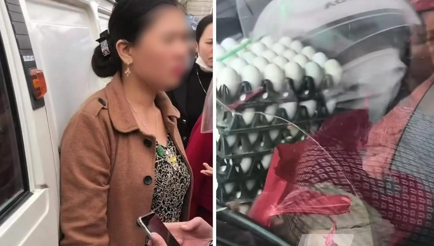 nguoi-phu-nu-ban-trung-thay-tui-tien-trong-xe