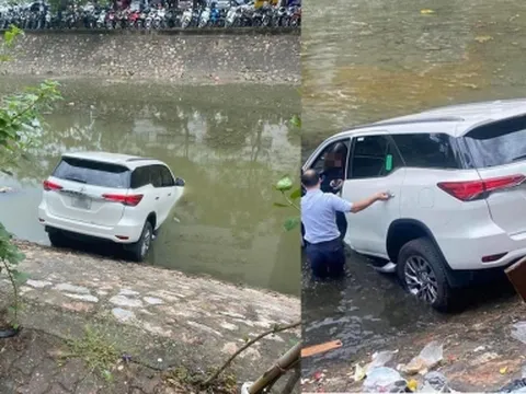 Nữ tài xế lao Toyota Fortuner cắm đầu xuống sông Kim Ngưu