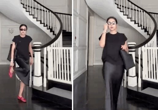 Cô từng khiến công chúng trầm trồ khi diện set đồ đen toàn tập gồm áo, váy lụa và khéo léo kết hợp cùng đôi giày lưới đỏ rực