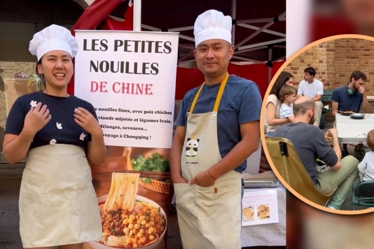 Anh Ding và vợ bên xem mì bán ở vỉa hè của mình mỗi ngày kiếm được 1.200 USD 