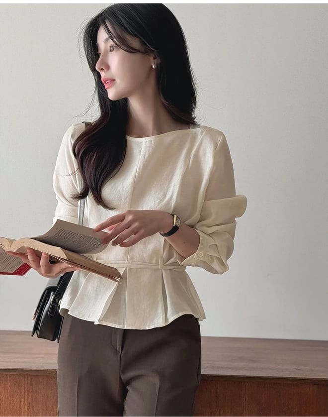 Dù kết hợp theo phong cách nào, chiếc áo nhấn eo vẫn giúp người mặc tỏa sáng với vẻ thanh lịch và nữ tính.