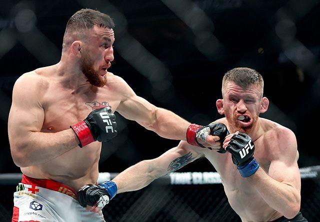 Merab Dvalishvili celebrating in the octagon