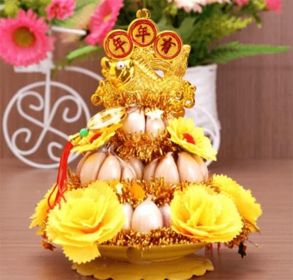 Ngoài khả năng xua đuổi điều không may, tỏi còn được xem như vật phẩm chuyển hóa vận xui thành điều tốt lành.