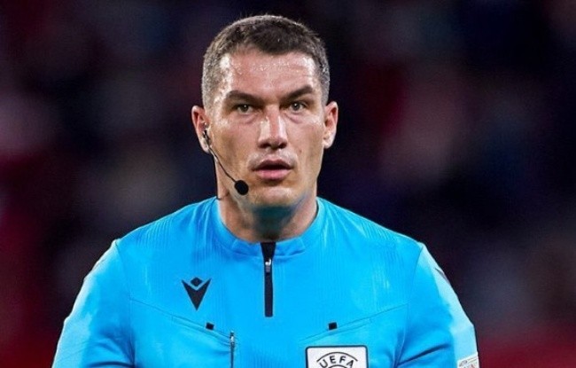 Ông Istvan Kovacs cầm còi trận đại chiến Liverpool vs Real.