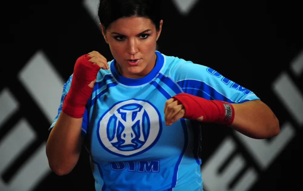 Gina Carano và Kimbo Slice trong một buổi tập luyện và gặp gỡ truyền thông