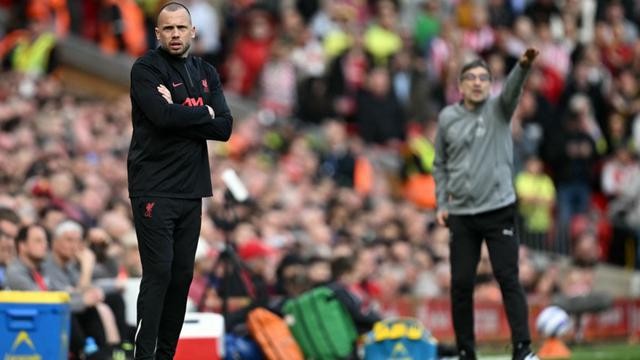 Giai đoạn ở Liverpool đã giúp John Heitinga nhận được lời mời từ Ajax.