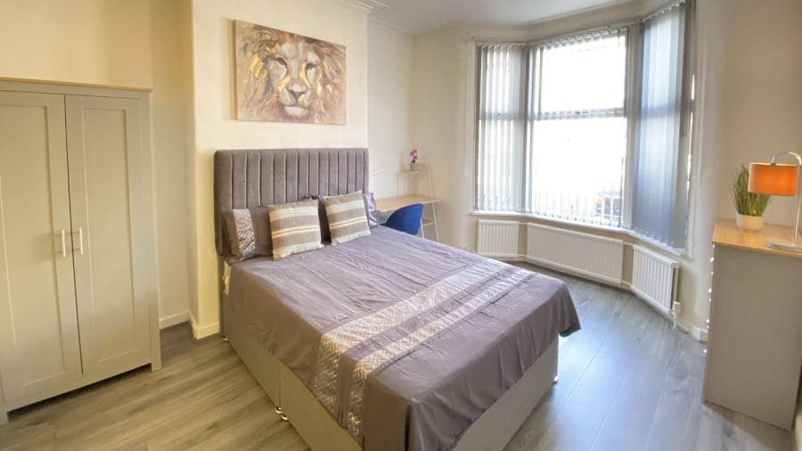 Gia chủ không nên kê giường ngủ đối diện cửa phòng.