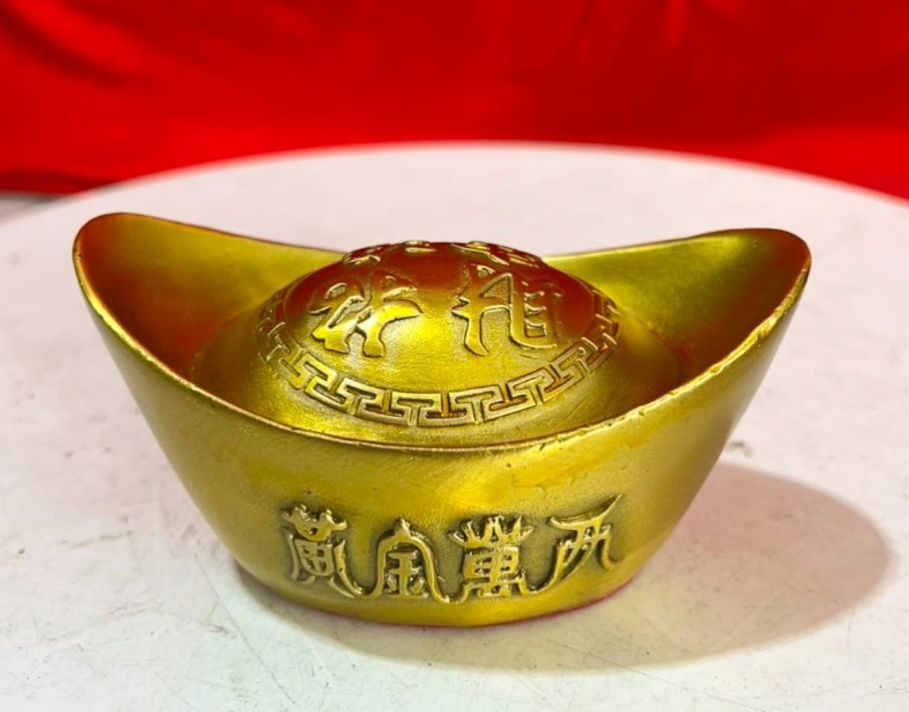 Thỏi vàng ròng có màu sắc tươi tắn rực rỡ, ý nghĩa may mắn tốt lành. (Ảnh minh họa)