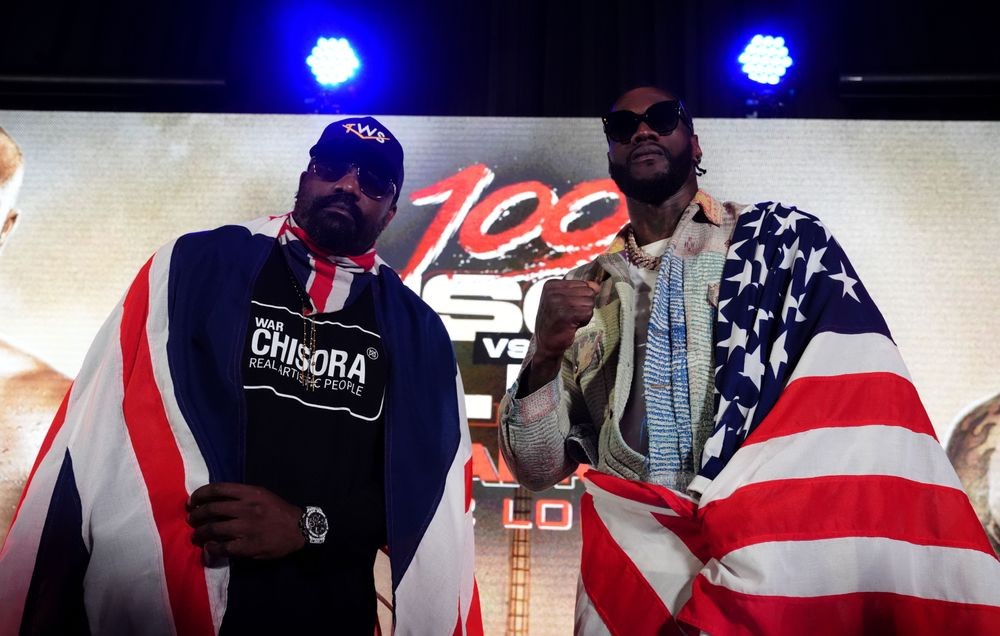 Deontay Wilder và Dereck Chisora trong buổi họp báo trước trận đấu tại London