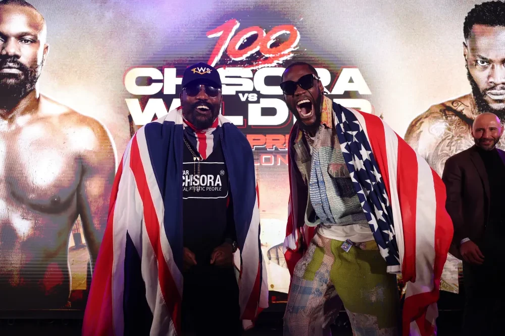 Chisora và Wilder trong một buổi họp báo