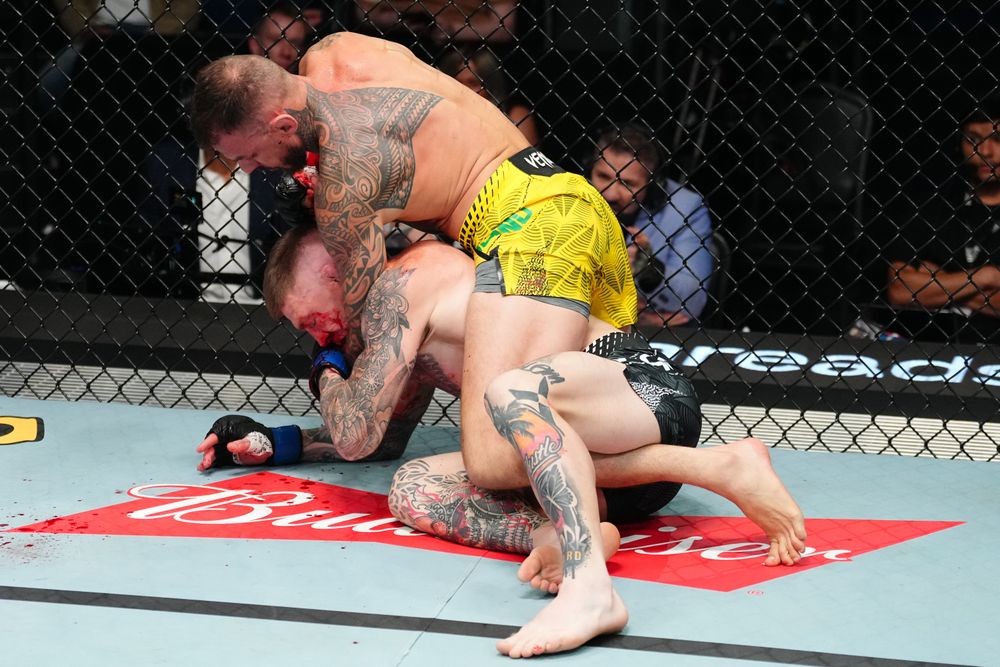 Renato Moicano of Brazil works for a submission against Chris Duncan of Scotland in a lightweight fight during the UFC Fight Night event