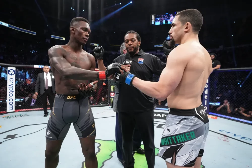 Israel Adesanya và Robert Whittaker
