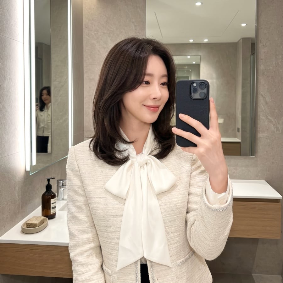 Kiểu t&oacute;c với phần đu&ocirc;i uốn cụp nhẹ v&agrave;o trong lu&ocirc;n mang lại cảm gi&aacute;c thanh lịch v&agrave; mềm mại