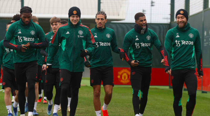 Christian Eriksen was pictured taking part in Manchester United's training session at Carrington on Monday morning. - Bóng Đá