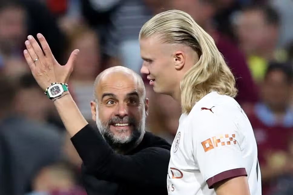 Pep Guardiola hôn Haaland 'làm lành' khi lập kỷ lục với Man City - Bóng Đá