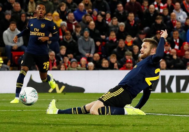 Shkodran Mustafi mocked by Arsenal hero Alan Smith after shocking own goal during Liverpool clash - Bóng Đá