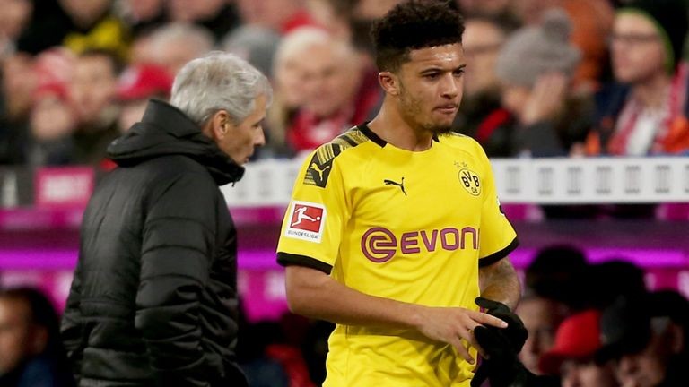 Watch Jadon Sancho laugh off Man Utd fan’s plea for him to transfer from Dortmund after posing for photo - Bóng Đá