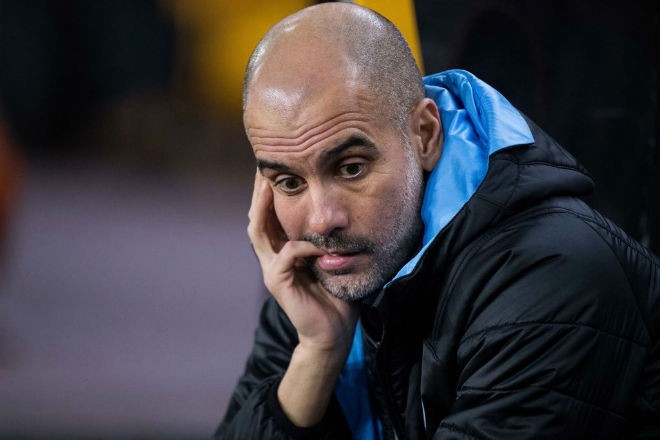 Man City manager Pep Guardiola reacts to Raheem Sterling's Real Madrid photo shoot - Bóng Đá