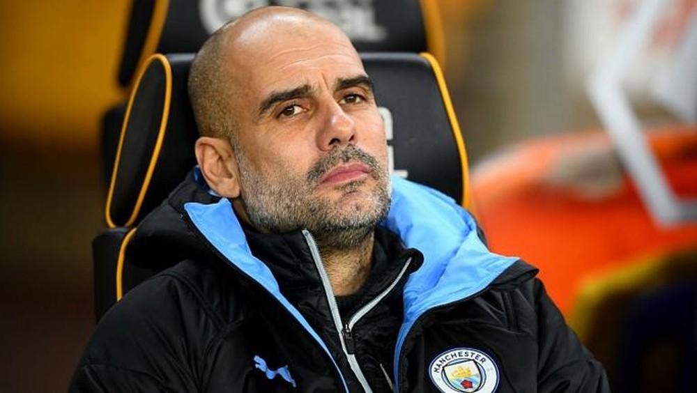 Man City manager Pep Guardiola reacts to Raheem Sterling's Real Madrid photo shoot - Bóng Đá