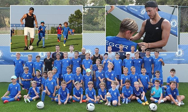 Eden Hazard poses with Chelsea kids at Greek football course 20 days AFTER leaving the club in £150million move to Real Madrid - Bóng Đá