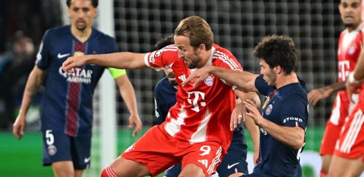 Kane được hàng thủ PSG chăm sóc kỹ lưỡng.