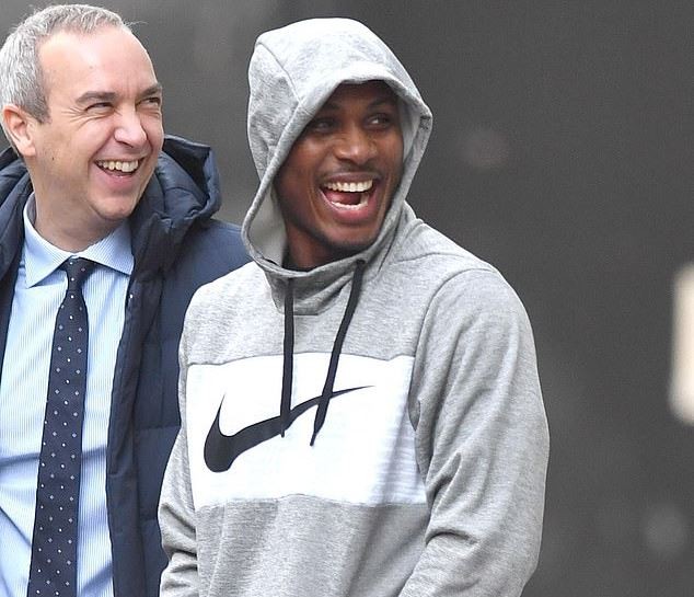 Odion Igahlo is all smiles as he steps out of the Lowry Hotel in Manchester, - Bóng Đá