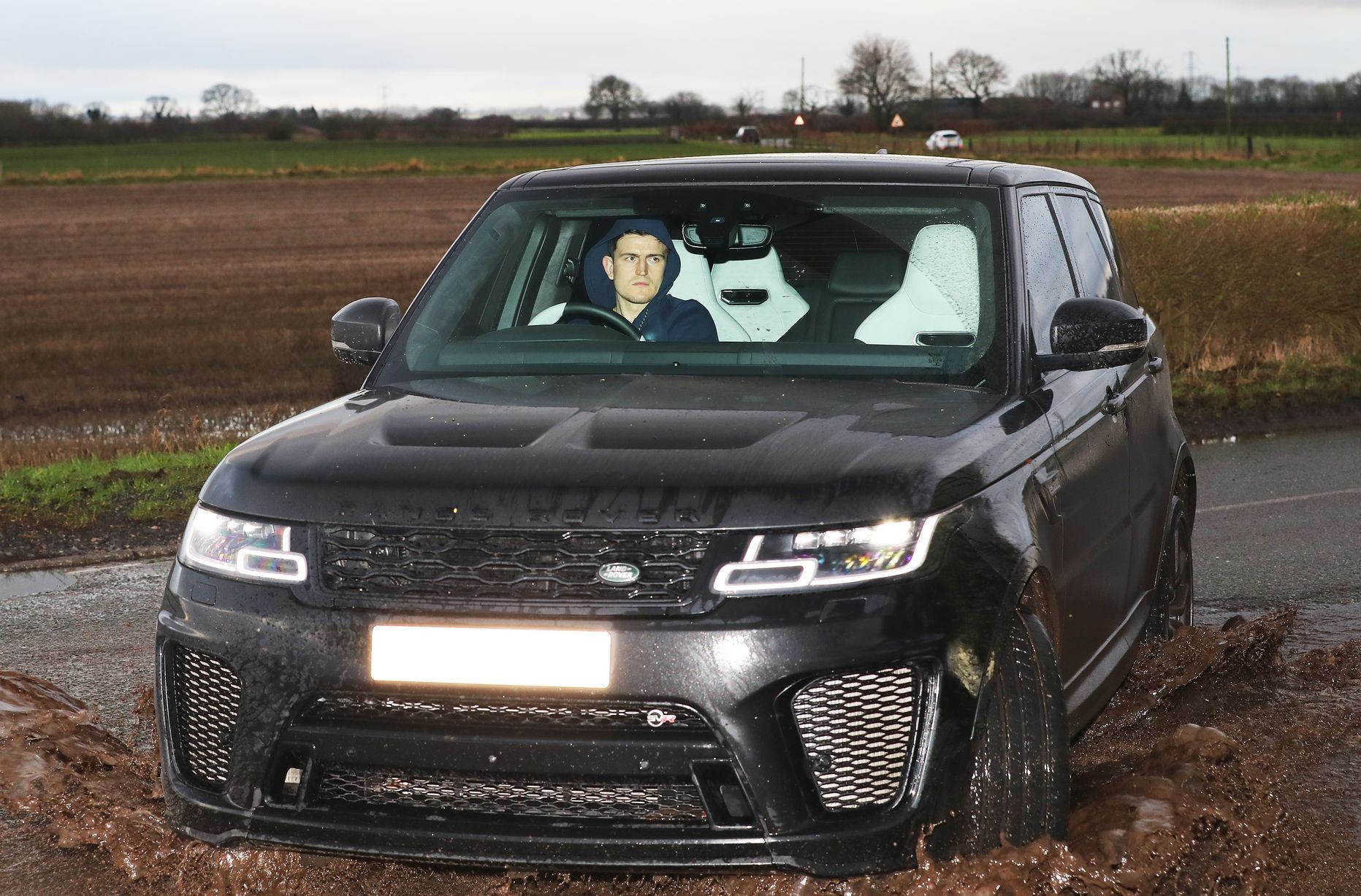 Ashley Young and Harry Maguire arrive for Manchester United training - Bóng Đá