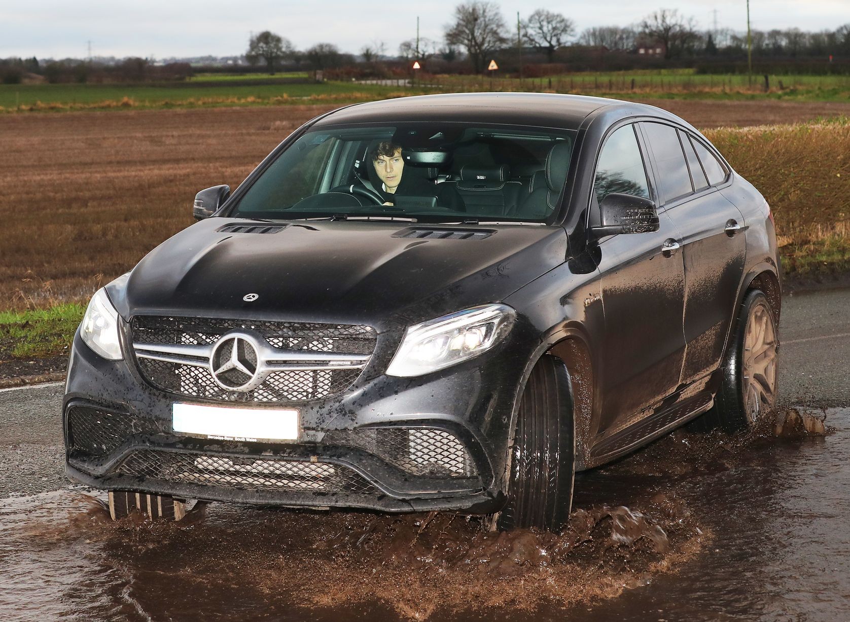 Ashley Young and Harry Maguire arrive for Manchester United training - Bóng Đá
