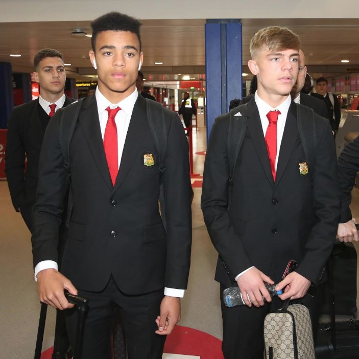 Odion Igahlo is all smiles as he steps out of the Lowry Hotel in Manchester, - Bóng Đá