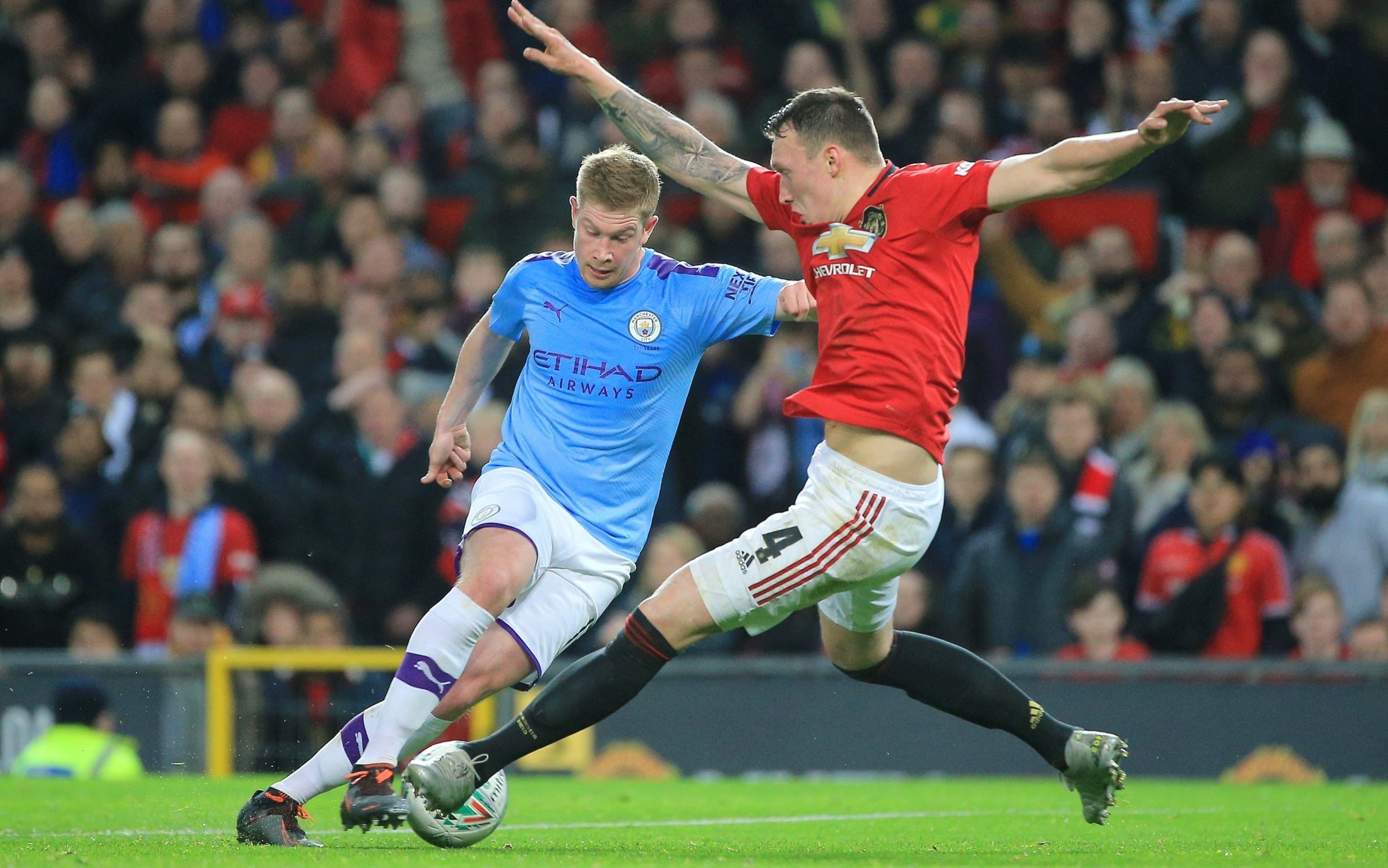 Manchester United midfielder Scott McTominay pictured on crutches after injury - Bóng Đá