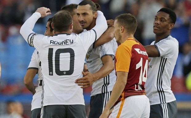 36BB61E000000578-3716156-United_captain_Wayne_Rooney_congratulates_his_new_team_mate_afte-a-30_1469909445837