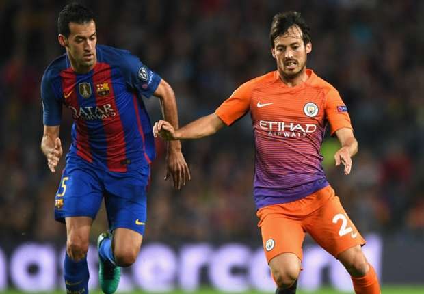sergio-busquets-david-silva-barcelona-manchester-city-champions-league_14t9ku0y8xp381wrwb5ooetcbp