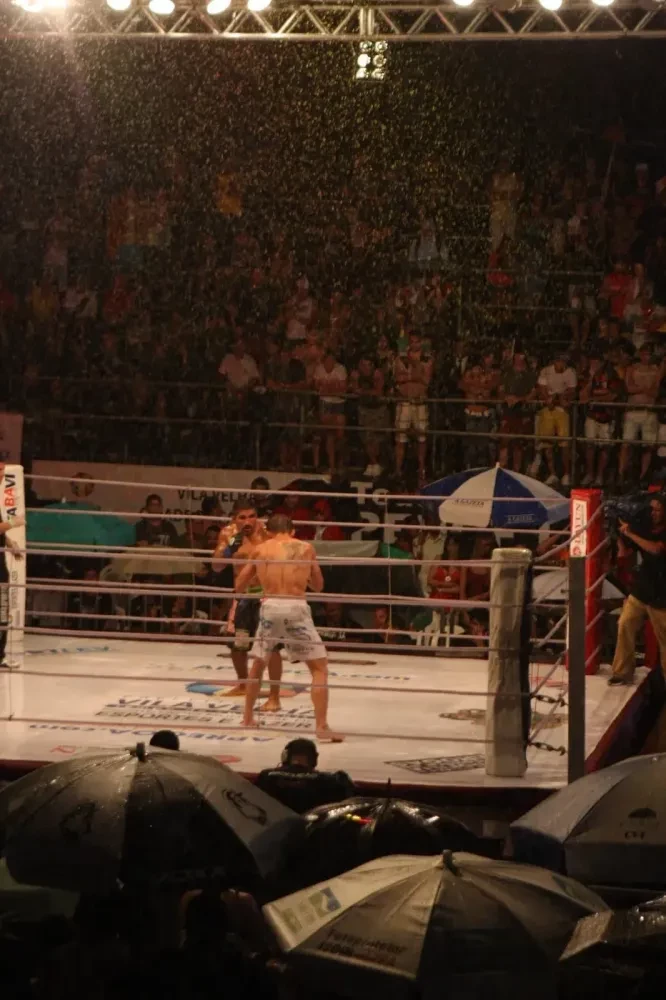 Fighter slipping on wet canvas