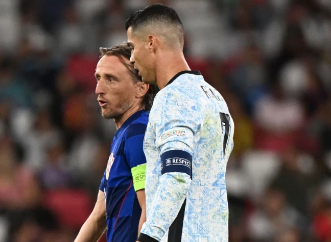 Ronaldo và Modric sẽ đối đầu nhau ở vòng 32 đội. Ảnh: Getty Images.