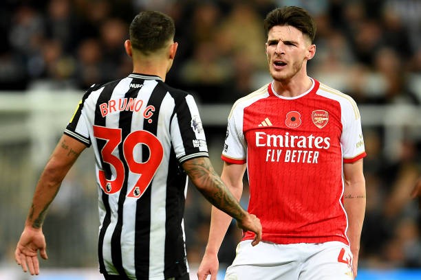 Bruno Guimaraes và Declan Rice giờ đã là đồng đội. Ảnh: Getty Images. 