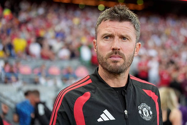 Carrick không hài lòng khi MU thua AC Milan. Ảnh: Getty Images.