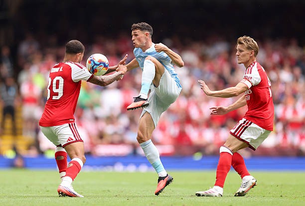 Odegaard và Guimaraes giờ đã là đồng đội. Ảnh: Getty Images. 