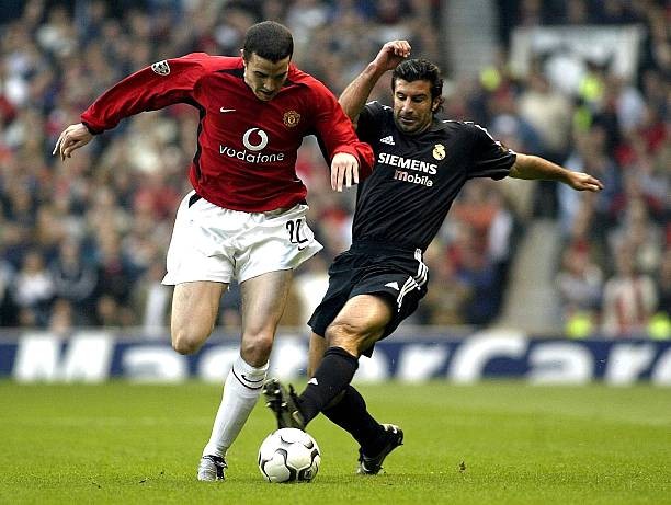 O'Shea khiến Figo bất ngờ bằng pha xử lý táo bạo. Ảnh: Professional Sport/Popperfoto/Getty Images.