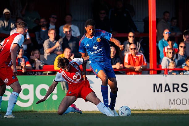 Chido Obi tạm chia tay MU để tu nghiệp ở Willem II. Ảnh: Ash Donelon/Manchester United via Getty Images.