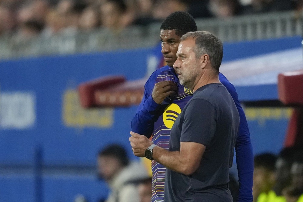HLV Hansi Flick giúp Rashford tìm lại phong độ trước khi trở lại MU. Ảnh: EPA Images. 