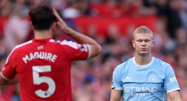 Man United và Man City nhập cuộc hứng đầu sau tiếng còi khai cuộc. Ảnh: Carl Recine/Getty Images.