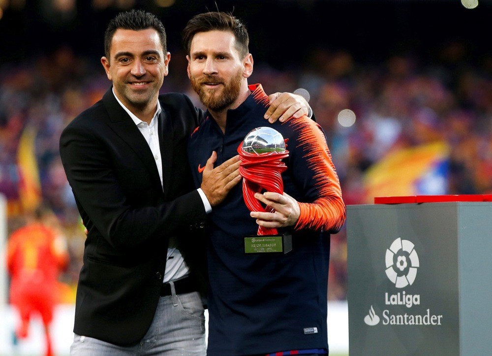 Xavi từng rất muốn đưa Messi quay lại Barca. Ảnh: EPA.