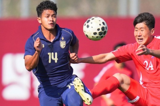 U23 Triều Tiên (áo đỏ) được chờ đợi có thể cản bước U23 Nhật Bản. Ảnh: Changsuek.