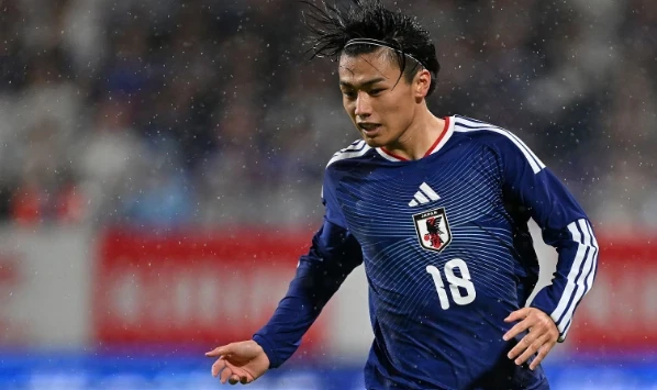 Ayase Ueda hóa người hùng của Nhật Bản. Ảnh:  Kenta Harada/Getty Images.