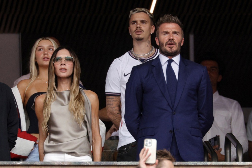 Gia đình Beckham xem trận đấu ở World Cup. Ảnh: EPA.